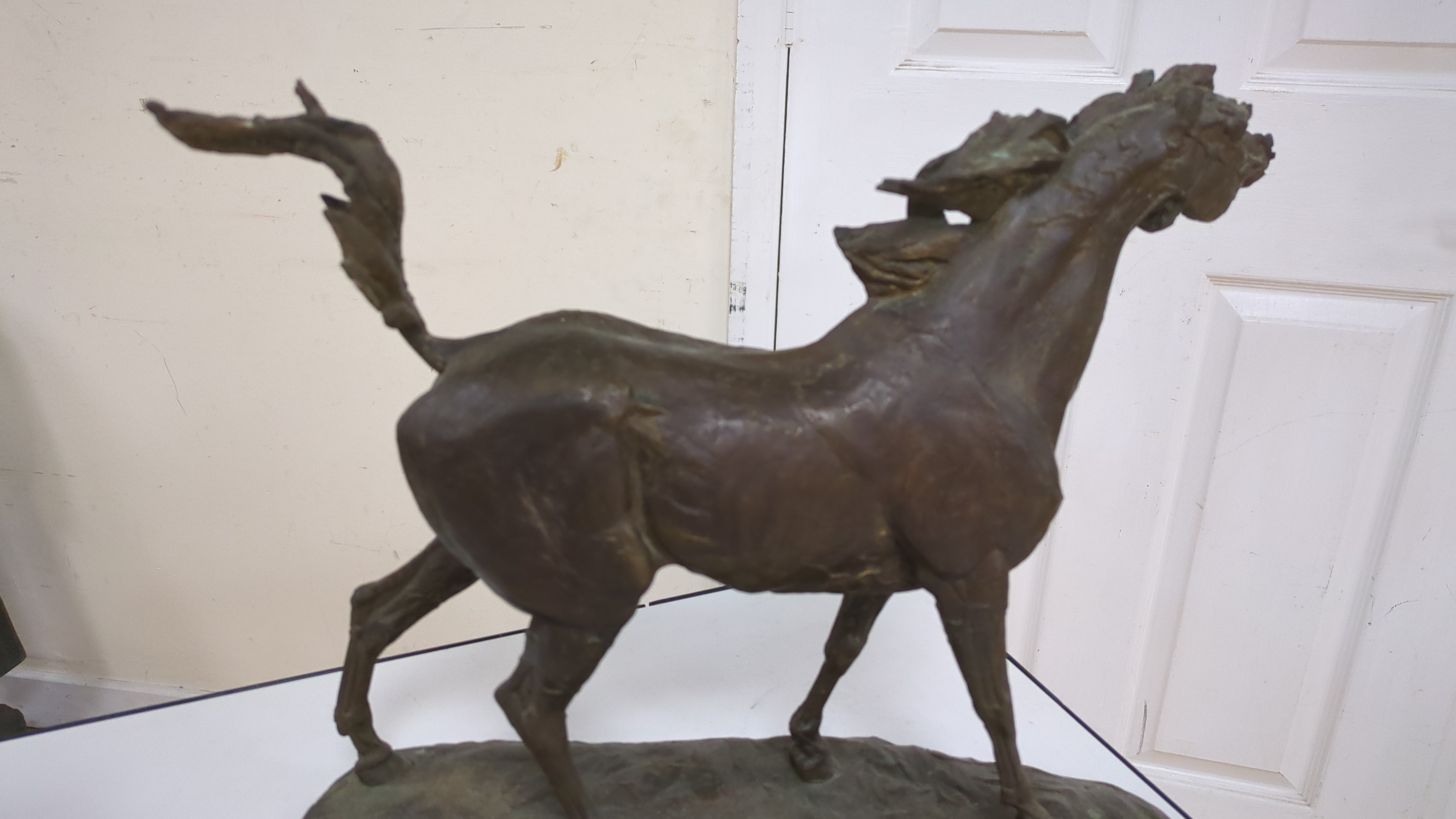 A Cobbler model, toy fort, resin horse etc.
